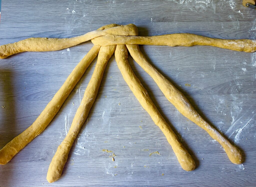 braiding pumpkin challah