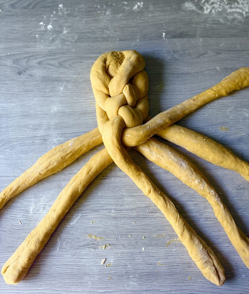 braiding pumpkin challah