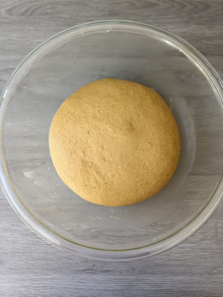 proofed pumpkin challah dough