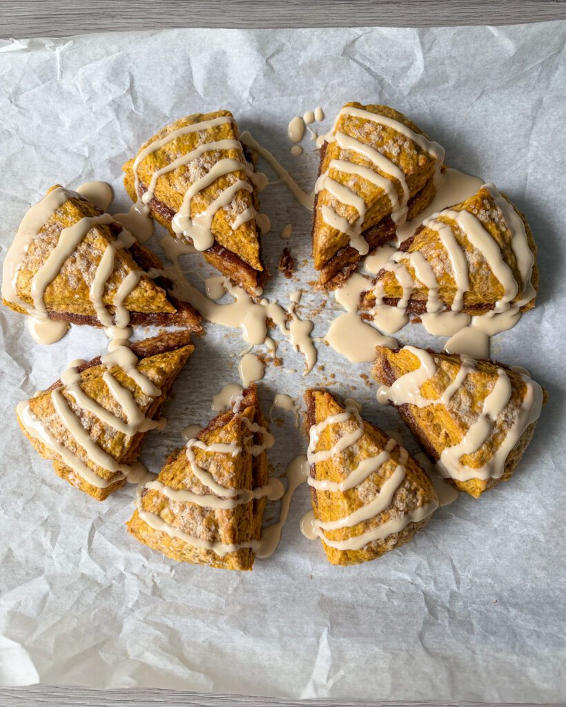pumpkin cinnamon roll scones with glaze